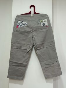 Brand new Capri Pants with Floral Detail
