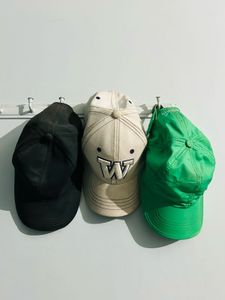 3 Baseball Caps One Premium
