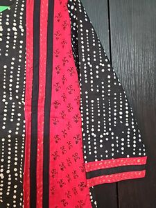 Beautiful Kurti In Black With Red Work Patches