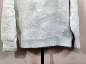 premium imported white V-neck mohair sweater.
