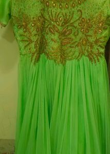 Elegant Green Embroidered Dress with Gold Detailin