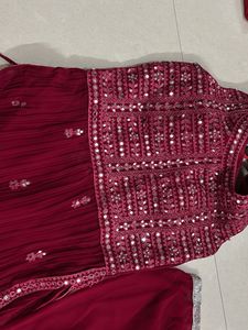 Red Mirror work lehanga with flared bottom and net