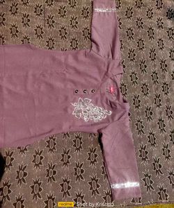 A Beautify Kurti With Beeds Work Design