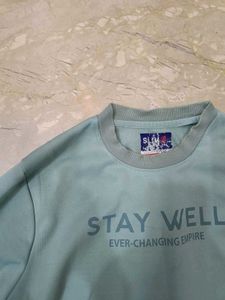green sweatshirt