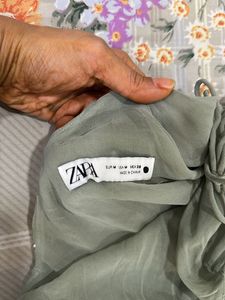 A teal sequinned top perfect for parties