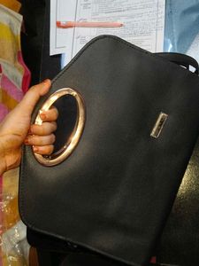Black Handbag with Gold Handle