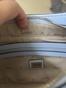 GUESS Women Solid Half Moon Fringed Shoulder bag