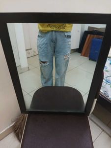damaged jeans .