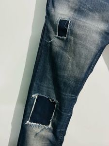 Distressed Denim Jeans with Patches