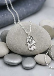 tree and Humsa necklace