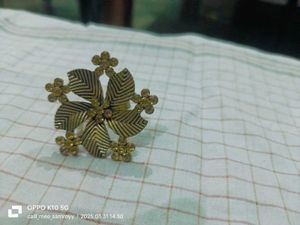 Gajra,safetypin,earring,ring,Clutcher