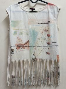 Printed white tank top with fringes