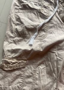 Adjustable drawstring beige cargo pant