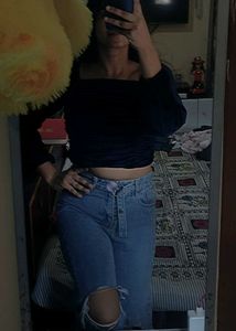 Top and Ripped Knee Jeans