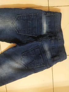 Skinny Blue Jeans With Distressed Pattern