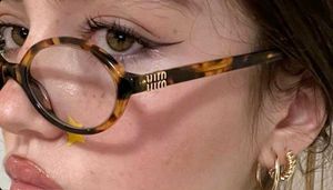 MiuMiu Glasses