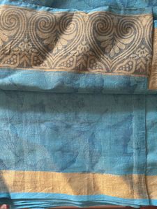 Blue Net Saree With Cream Border
