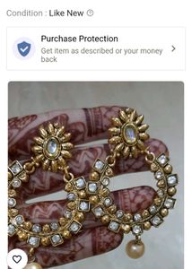 2 Pair Earings And A Neckpiece With Earing
