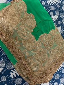 a green with golden heavy work