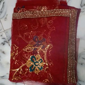 Embroidered Maroon net saree