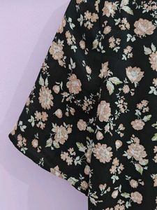 a black floral tie up dress