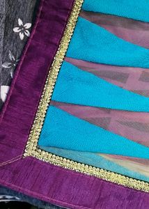Saree In Multi Colour With Golden Lace.