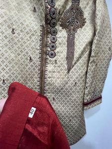 gold and maroon sherwani with shoes