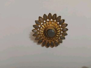 Gold tone floral adjustable ring