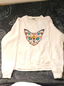 White Sweatshirt with Colorful Cat