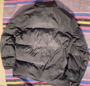 black oversized puffer jacket