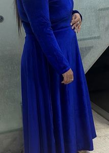 A Scintillating Velvet Blue Party wear Gown