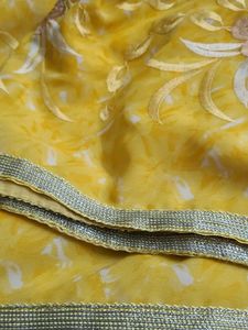 Yellow Sareewith Silver Sides