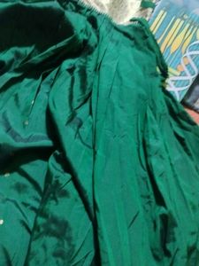It&#39;s a Green Pleated Gown (Stiched) With Heavy (Bi