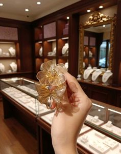 Gold Flower & Butterfly Statement Bracelet