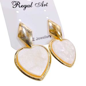 Radiant Gold-Pearl Plated Heart Earrings