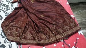 Beautiful Saree With Stitched Blouse.