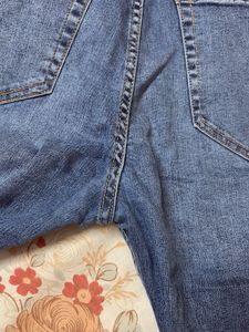 Ripped Knee Denim Jeans