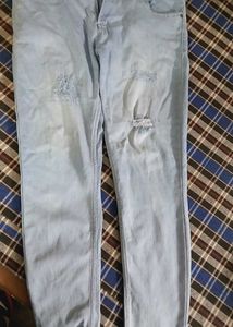 Ripped Light Wash Denim Jeans