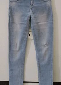Light Wash Distressed Skinny Jeans