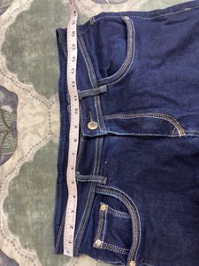 Combo of green shirt and denim jeans