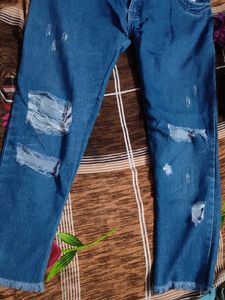 Ripped Blue Denim Jeans