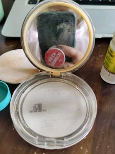 Empty Bottles And Compact Puffs For Re-use