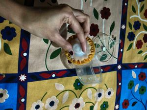 Powder puff with container