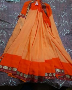 Classicate Orange Embroidered Chiffon Saree
