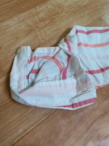 Stylish White Shorts with Bold Orange Lining – Spo