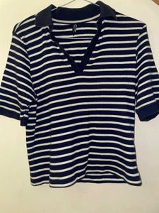 Stripes never go out of style Grab this classy pol