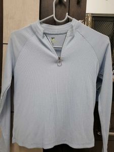 Sporty Chic Sky Blue Zip-Up Top