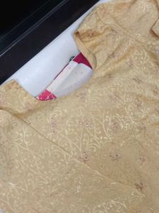 Elegant golden colour Indian suit