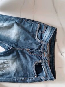 Distressed Denim Jeans