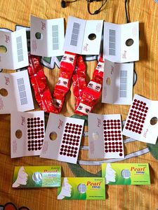 13 bindi sets and 12 kajal set